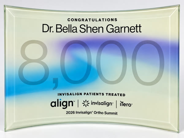 Award recognising Dr. Bella Shen Garnett for 8,000 Invisalign patients treated